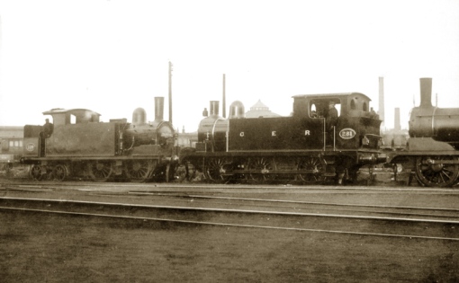 No. 281 in the guise of the Stratford Works shunter, and an interesting photo for all sorts of reasons. The date is no earlier than November 1893 when the loco was refitted with Holden’s patent oil burning apparatus – the fuel tank can be seen in the bunker, and the date can be no later than 14th June 1894 when E10 class no.239 was withdrawn from service (here it's still in steam and in service with a Stratford destination board which were drawn daily from the stores).  No.281 has already been fitted with the cut-down stovepipe chimney and still sports a Roscoe lubricator on the side of the smokebox. Although it appears to be freshly painted in the black goods livery, in the original photograph there is enough definition to clearly see  the ultramarine blue and black borders. The unidentifiable Y14 on the right hasn’t yet been fitted with the Macallen blast pipe. The roof of the Polygon can be seen in the background.  Photograph ©Public Domain.