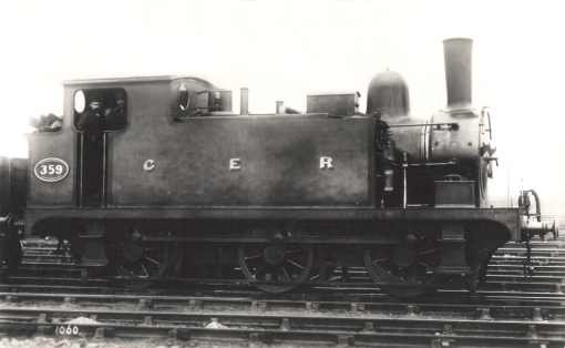 No.359 of Order R29 was ex-Works on 15 March 1892 and released to traffic on the 11 April.  The similarities with the T18 design are obvious, but the relatively minor changes make it ‘just so’.  The maximum date range for the photograph is 1893-1904 between the fitting of the condensing apparatus and its first rebuild. It has all the usual accoutrements of the early passenger R24s; early square-corner smokebox from built-up angle iron, the Worsdell blower attached to the end of the separate handrail, destination brackets on the smokebox door (and bunker), Holden’s tank filler lids with leather seals, the condensing chamber on the tank top along with the U-shaped tapered casting, copper connecting and vent pipes, and no coal rails on the bunker. The crew have moved the toolbox forward of the condensing pipes. The passenger rated tanks had 10-spoke balanced wheels with a 10” crank throw which led to straight brake pull rods, the Westinghouse pump in the tank front exhausting into the smokebox, brake hoses and screw couplings, and finally the passenger livery of ultramarine blue, lined vermilion and bordered black.  Photo © Public Domain. 