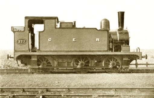 Not the best of photographs, No.377 the first loco from Order F36 was ex-Works on 10 October 1895. The photo was almost certainly taken just prior to its release to traffic on 11 November of that year.  The loco represents the pinnacle of the passenger R24 design before rebuilding began. The new-style flanged smokebox, continuous handrails and rotary blower, condensing chambers built into the tank tops with side-sheets extending to the top (and that curve down to the filler lid), and three coal rails on the bunker. The toolbox has been lined out (and on the original it’s numbered). Photo © Public Domain.