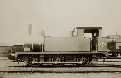 T18 no.275 - the first of a very long line of Buckjumpers - sitting outside Stratford Works in 1886 sometime between 15th May when it was ex-Works and 7th June when it was released to traffic.  It's finished in the photographic French grey livery with slate grey borders and white lining - and no GER transfers.  There are some interesting details in the background including the Eastern Counties Railway tender on the left, the design of which dates from 1859, to the boiler on the Service Department 3-plank dropside wagon on the right. I have another photograph taken at the same time which shows three bowler-hatted gents (possibly from the Drawing Office) posing on the running plate.  Photograph ©Public Domain.
